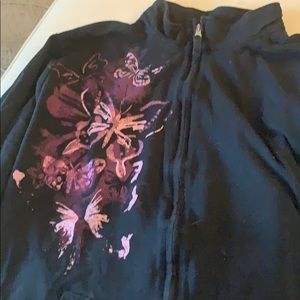Zip down sweatshirt.  Purple butterfly detail.